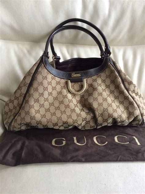 cuánto cuesta una bolsa gucci|cartera Gucci original.